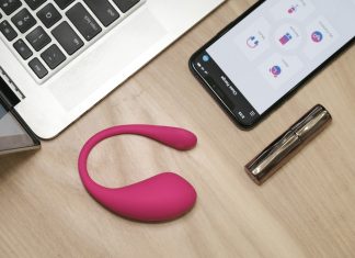 Don’t Trash It Yet: How to Recycle Old Sex Toys Responsibly a cell phone, a pen, and a laptop on a desk